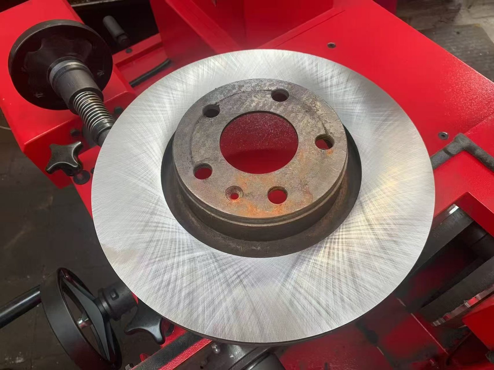 A freshly machined rotor on the red lathe